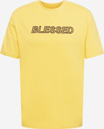 PUMA Тениска в жълто: отпред