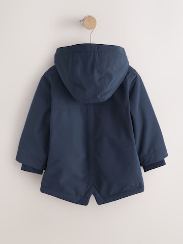 Next Mantel in Blau