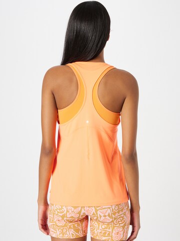 UNDER ARMOUR Sportovní top 'Rush Energy' – oranžová