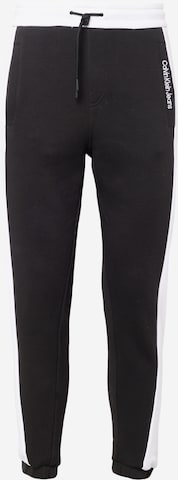 Calvin Klein Jeans Tapered Pants in Black: front