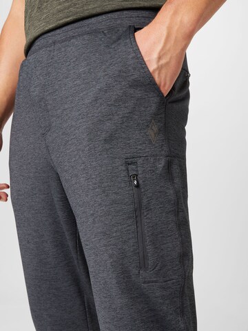 Effilé Pantalon de sport SKECHERS en gris