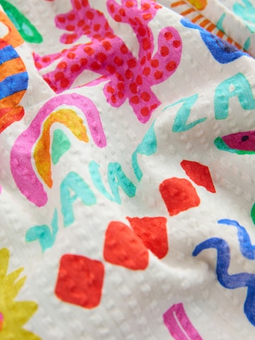 Ensemble Next en blanc