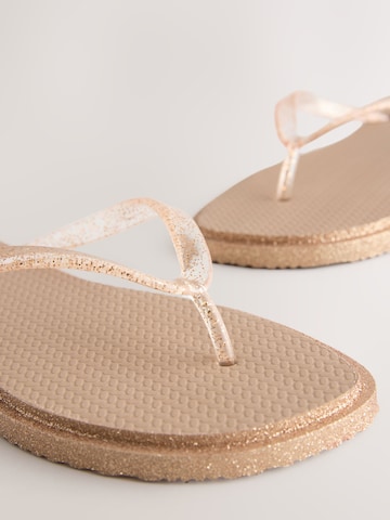 Séparateur d'orteils Next en or