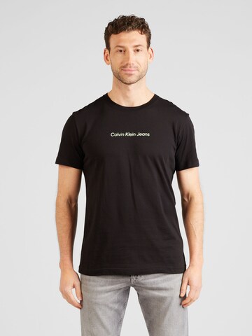 T-Shirt Calvin Klein Jeans en noir : devant