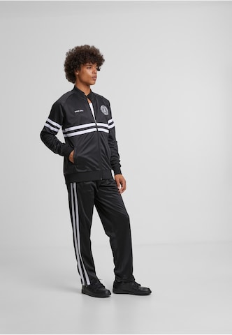 regular Pantaloni sportivi di Unfair Athletics in nero