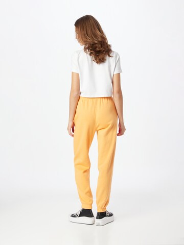PIECES Tapered Trousers 'Chilli' in Orange