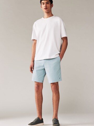regular Pantaloni chino di Next in blu