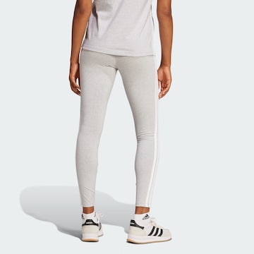 Skinny Pantaloni sportivi 'Essentials' di ADIDAS SPORTSWEAR in grigio
