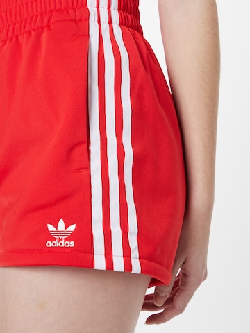 ADIDAS ORIGINALS Regular Trousers '3-Stripes' in Red