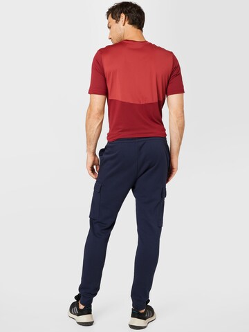 ADIDAS SPORTSWEARTapered Sportske hlače 'Essentials Fleece  Tapered ' - plava boja