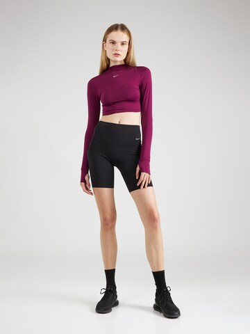 NIKE Performance shirt 'One Luxe Ess' in Red