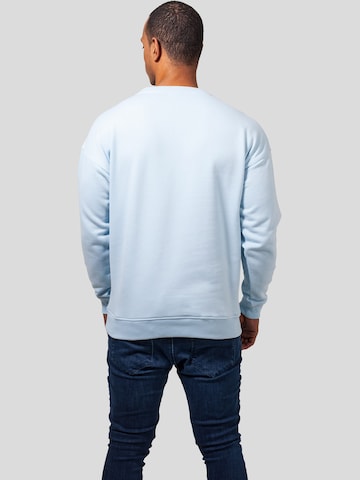 Sweat-shirt Urban Classics en bleu