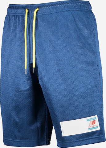 Pantalon de sport new balance en bleu : devant