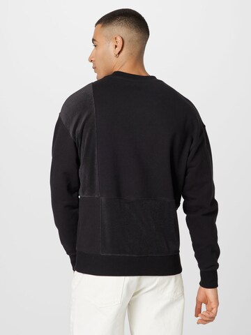 PUMA Sweatshirt in Zwart