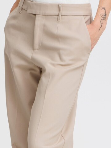 PULZ Jeans - Pierna ancha Pantalón de pinzas 'Bindy' en beige