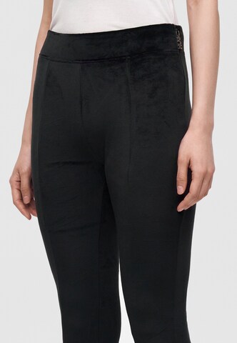 Flared Pantaloni 'Nucutey_B' di HUGO in nero