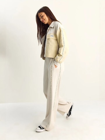 Pantalons de tailleur Bianco Lucci en beige