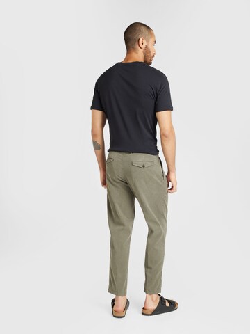 Tapered Pantaloni con pieghe 'DEVYN' di DRYKORN in verde