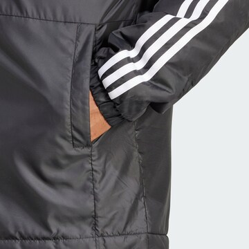 ADIDAS SPORTSWEAR - Chaqueta de montaña 'Essentials' en negro
