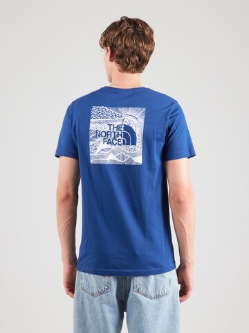 T-Shirt 'Redbox Celebration' THE NORTH FACE en bleu : devant