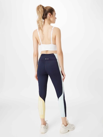 ADIDAS SPORTSWEAR Skinny Workout Pants 'Own The Run Colorblock' in Blue