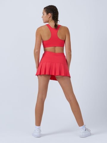 SPORTKIND - Falda deportiva 'Pleated Skirt' en naranja