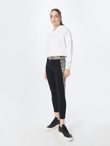 SKECHERS Skinny Sportbroek in Zwart