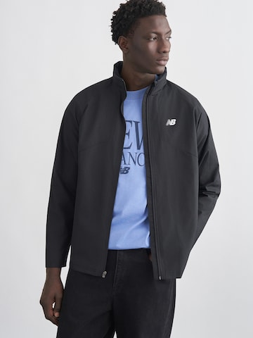 Veste mi-saison 'MJ53607' new balance en gris : devant