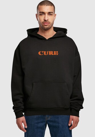 MT Upscale Sweatshirt 'Cure' in Zwart: voorkant
