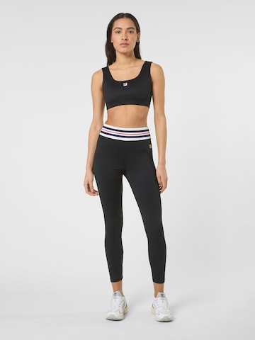 regular Leggings 'BIENTINA heritage tape active leggings' di FILA in nero