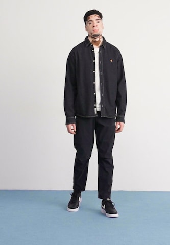 Nike Sportswear Tapered Byxa i svart