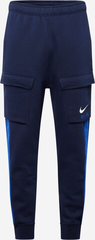 Pantaloni cu buzunare de la Nike Sportswear pe albastru: față