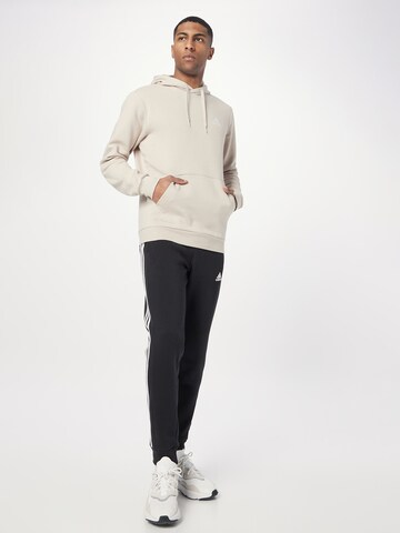 ADIDAS SPORTSWEAR - Sweatshirt de desporto 'Essentials Fleece' em cinzento