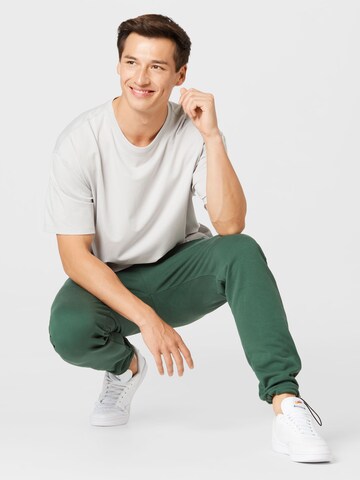 Kosta Williams x About You Regular Trousers in Green