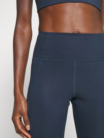 Girlfriend Collective Skinny Sportovní kalhoty ' Compressive ' – modrá
