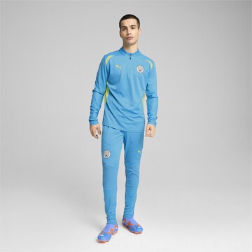 PUMA Slim fit Sports trousers 'Manchester City' in Blue