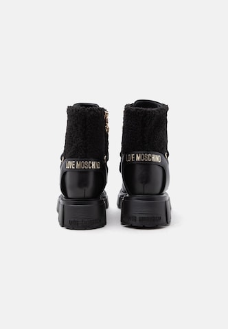 Love Moschino Paeltega poolsaabas, värv must