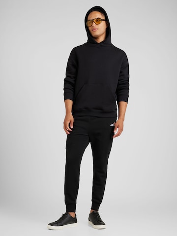 ELLESSE Tapered Gargohousut 'Davilas' värissä musta