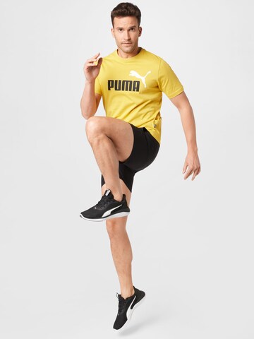 PUMA Performance Shirt 'Essentials' in Yellow