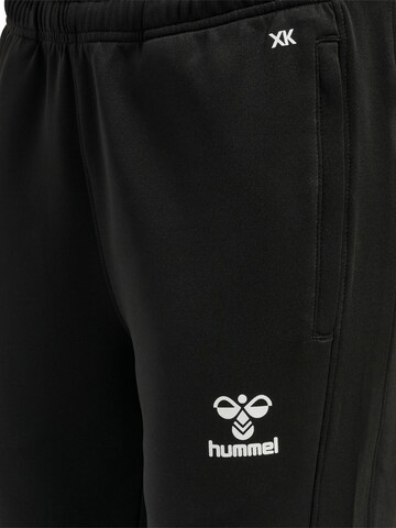 Coupe slim Pantalon de sport Hummel en noir