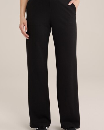 WE Fashion Slim fit Trousers in Black: front