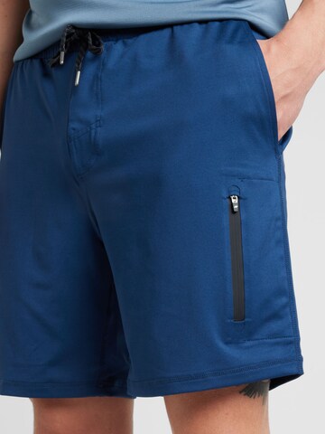 Regular Pantalon de sport SKECHERS en bleu