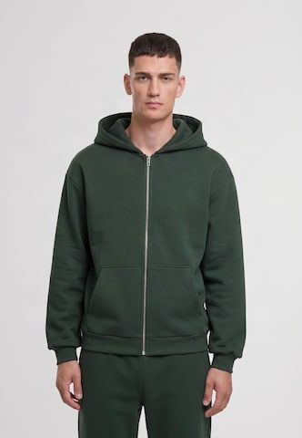Veste de survêtement Urban Classics en vert : devant