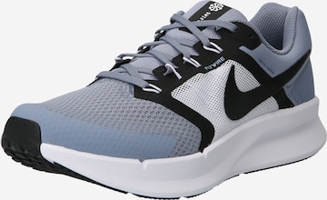 NIKE - Zapatillas de running en azul: frente