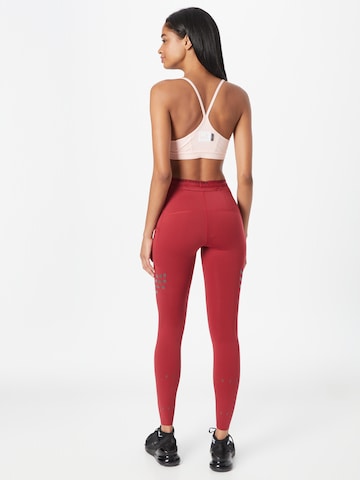 NIKE Skinny Športne hlače 'DIVISION' | rdeča barva
