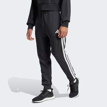 Tapered Pantaloni sportivi 'Essential' di ADIDAS SPORTSWEAR in nero: frontale