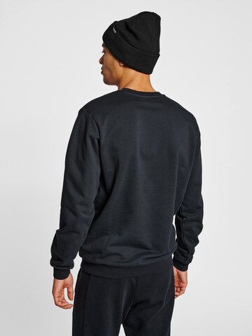 Hummel Sportsweatshirt 'Austin' in Zwart