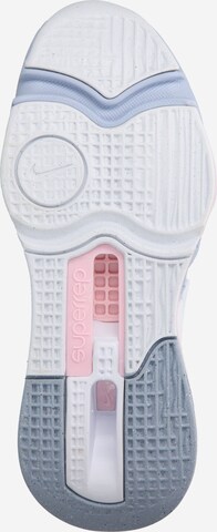 NIKE Sportschuh 'Zoom 4' in Grau