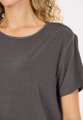 Athlecia Functioneel shirt 'LIZZY' in Bruin