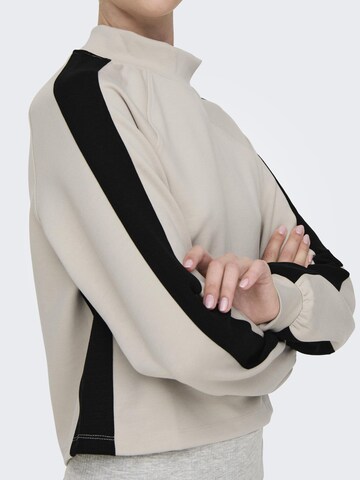 Sweat de sport ONLY PLAY en beige